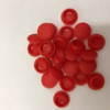 Collection of red silicone rubber end caps used to seal and protect open pipe ends, tubing, and threaded components