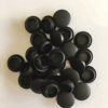 Pile of black silicone rubber end caps used to seal and protect exposed pipe ends, tubes, bolts, and fittings