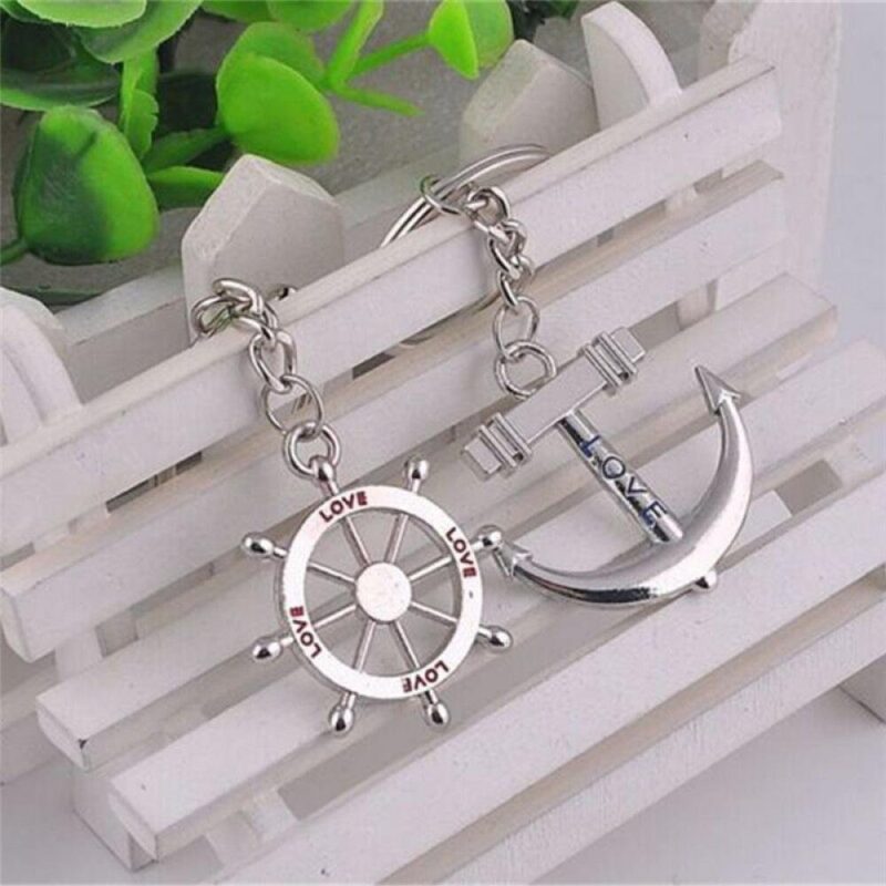 PAIR OF KEYRINGS ANCHOR AND WHEEL