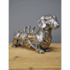 Angled view of steampunk dachshund sculpture featuring silver resin, brass gears, and gothic mechanical details