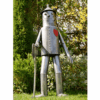 Large Tin Man garden statue with axe and heart in green garden